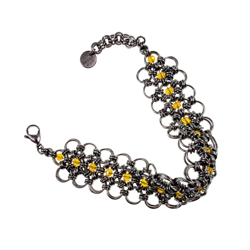Exclusieve Brede RVS Armband met Amberkleur Kristallen Handgemaakt Exclusieve Brede RVS Armband met Amberkleur Kristallen Handgemaakt